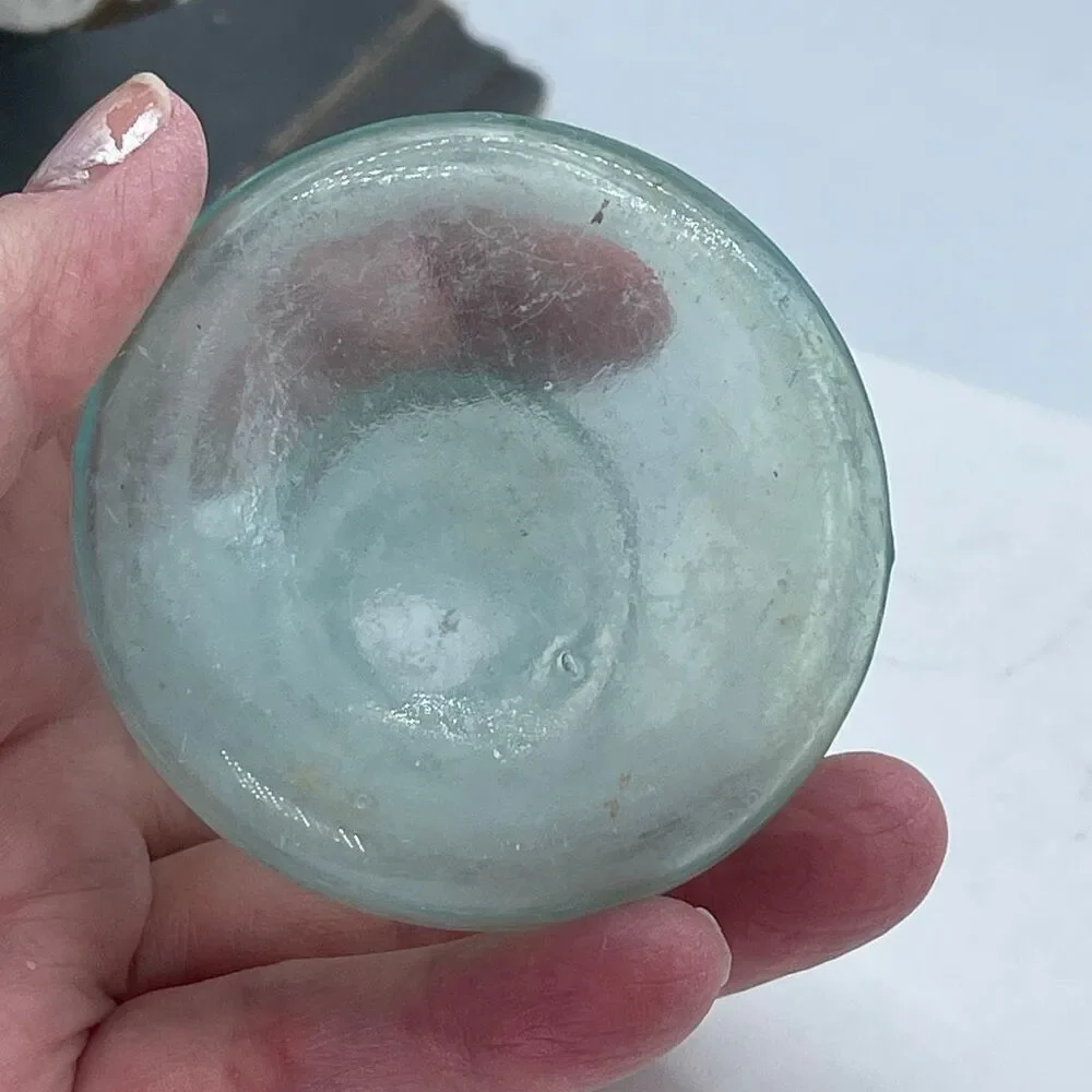 Antique Aqua -colored glass ink bottle Victorian era. Conical or umbrella shaped